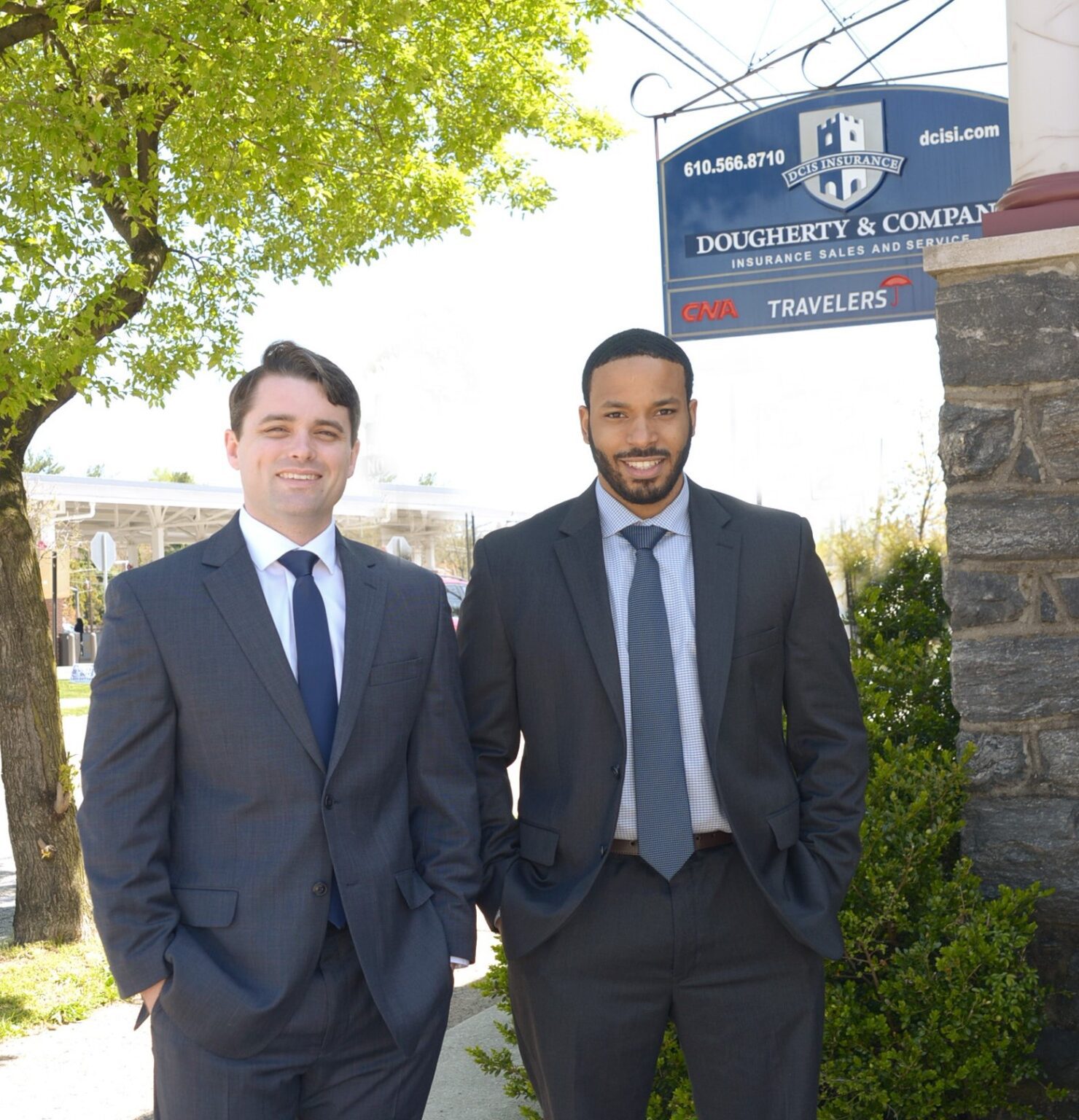 insurance partners standing outside office