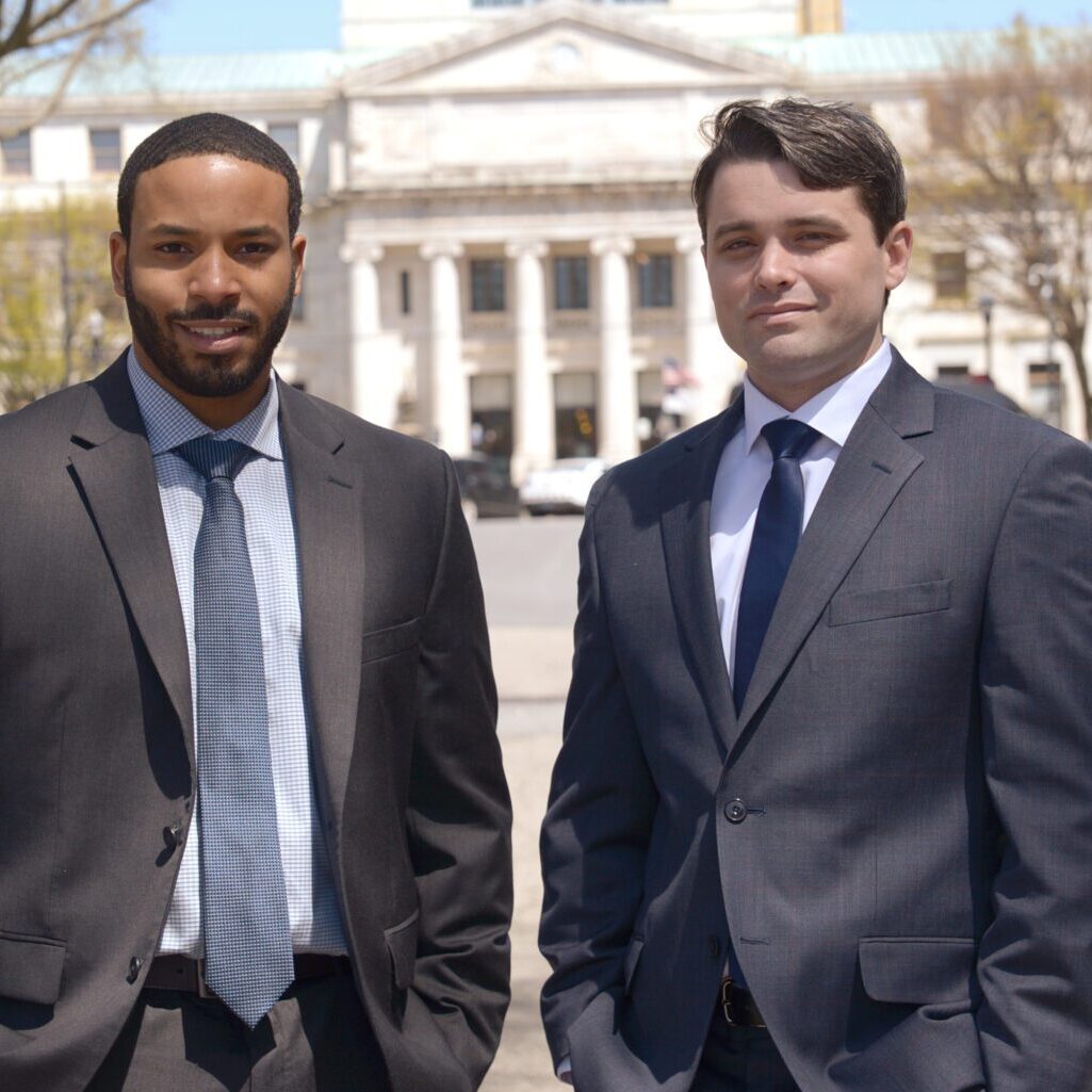 insurance partners standing outside of building