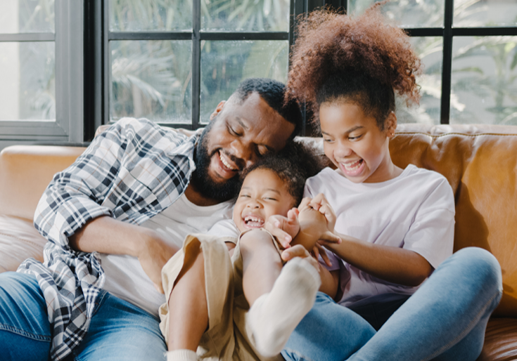 family sitting on a couch